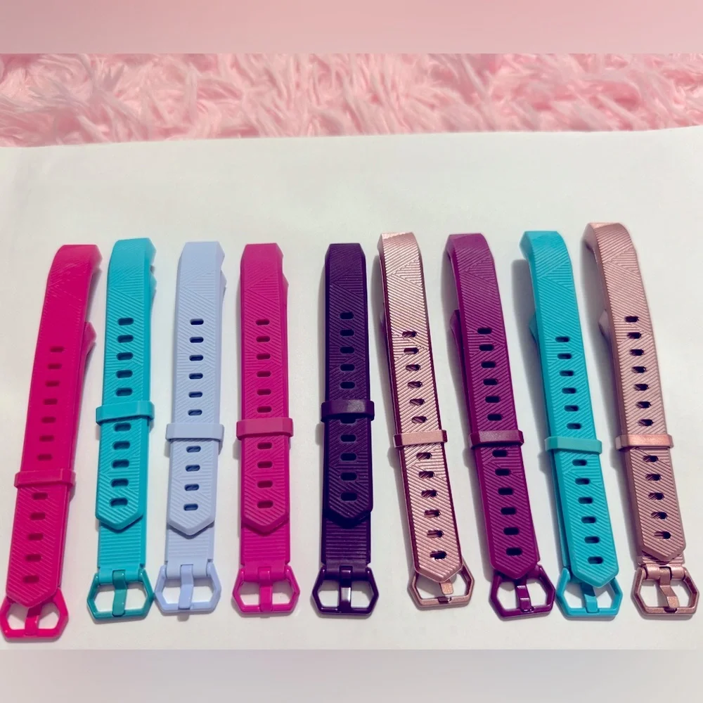 9 Fitbit Alta bands various colors. Size large. Compatable w/ only Fitbit Alta.